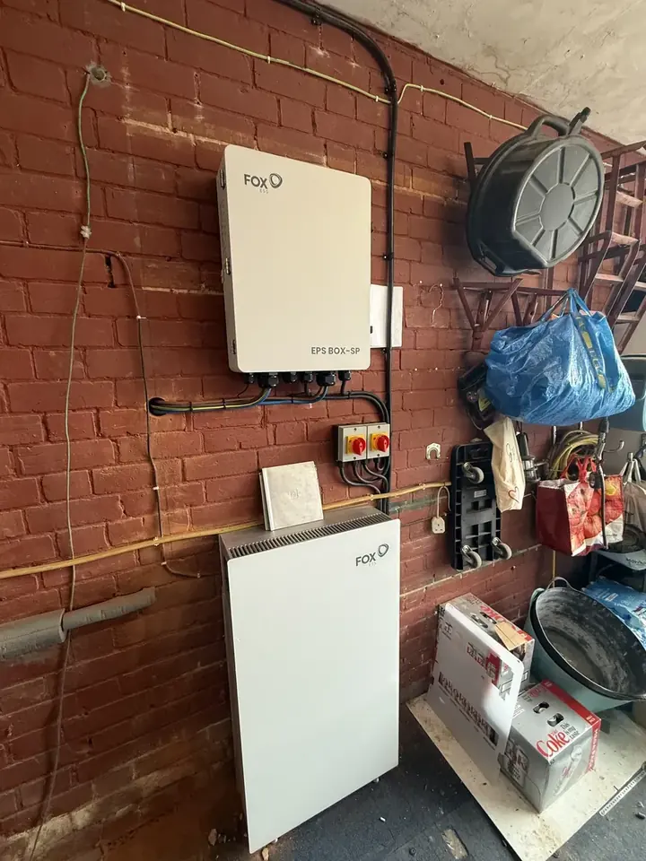 FOX EVO inverter and battery unit mounted on a garage wall in Reading